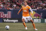 EAST RUTHERFORD, NJ - MAY 16:  Stuart Holden #22 of the Houston Dynamo plays the ball against the New York Red Bulls at Giants Stadium in the Meadowlands on May 16, 2009 in East Rutherford, New Jersey.  Houston and New York play to a 1-1 Tie.  (Photo by Mike Stobe/Getty Images for New York Red Bull)