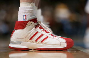 DENVER - NOVEMBER 18:  A detail of the footware of Austin Croshere #44 of the Milwaukee Bucks as he awaits action against the Denver Nuggets at the Pepsi Center on November 18, 2008 in Denver, Colorado. The Nuggets defeated the Bucks 114-105.  (Photo by Doug Pensinger/Getty Images)