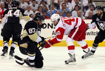 PITTSBURGH - JUNE 09:  Henrik Zetterberg #40 of the Detroit Red Wings has his shot blocked by Sidney Crosby #87 of the Pittsburgh Penguins during Game Six of the NHL Stanley Cup Finals at the Mellon Arena on June 9, 2009 in Pittsburgh, Pennsylvania.  (Photo by Jim McIsaac/Getty Images)