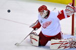 PITTSBURGH - JUNE 09:  Goaltender Chris Osgood #30 of the Detroit Red Wings saves a shot on goal by the Pittsburgh Penguins during Game Six of the NHL Stanley Cup Finals at the Mellon Arena on June 9, 2009 in Pittsburgh, Pennsylvania.  (Photo by Jamie Sabau/Getty Images)