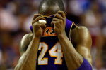 ORLANDO, FL - JUNE 09:  Kobe Bryant #24 of the Los Angeles Lakers wipes his face during the game against the Orlando Magic in Game Three of the 2009 NBA Finals on June 9, 2009 at Amway Arena in Orlando, Florida.  NOTE TO USER:  User expressly acknowledges and agrees that, by downloading and or using this photograph, User is consenting to the terms and conditions of the Getty Images License Agreement.  (Photo by Ronald Martinez/Getty Images)