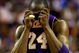 ORLANDO, FL - JUNE 09:  Kobe Bryant #24 of the Los Angeles Lakers wipes his face during the game against the Orlando Magic in Game Three of the 2009 NBA Finals on June 9, 2009 at Amway Arena in Orlando, Florida.  NOTE TO USER:  User expressly acknowledges and agrees that, by downloading and or using this photograph, User is consenting to the terms and conditions of the Getty Images License Agreement.  (Photo by Ronald Martinez/Getty Images)