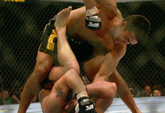 MANCHESTER, UNITED KINGDOM - APRIL 21: Lyoto Machida of Brazil and David Heath of England in action during a Welterweight bout of the Ultimate Fighting Championship at the Manchester Evening News Arena on April 21, 2007 in Manchester, England. (Photo by Gary M. Prior/Getty Images).
