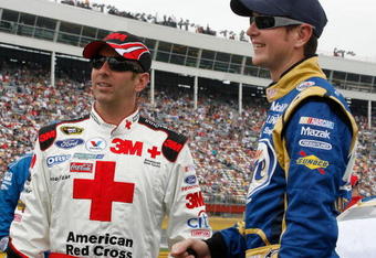 CONCORD, NC - MAY 25: Greg Biffle (L), driver of the #16 3M/Red Cross Ford, talks with Kurt Busch (R), driver of the #2 Miller Lite Dodge, prior to the NASCAR Sprint Cup Series Coca-Cola 600 on May 25, 2009 at Lowe's Motor Speedway in Concord, North Carolina.  (Photo by Geoff Burke/Getty Images for NASCAR)