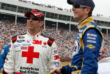 CONCORD, NC - MAY 25: Greg Biffle (L), driver of the #16 3M/Red Cross Ford, talks with Kurt Busch (R), driver of the #2 Miller Lite Dodge, prior to the NASCAR Sprint Cup Series Coca-Cola 600 on May 25, 2009 at Lowe's Motor Speedway in Concord, North Carolina.  (Photo by Geoff Burke/Getty Images for NASCAR)