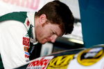 DOVER, DE - MAY 30:  Dale Earnhardt Jr. looks over the engine of the #88 AMP Energy/National Guard Chevrolet in the garage during practice for the NASCAR Sprint Cup Series Autism Speaks 400 at Dover International Speedway on May 30, 2009 in Dover, Delaware.  (Photo by Jason Smith/Getty Images for NASCAR)