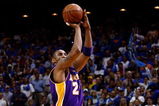 ORLANDO, FL - JUNE 09:  Kobe Bryant #24 of the Los Angeles Lakers shoots a jumper over Mickael Pietrus #20 of the Orlando Magic in Game Three of the 2009 NBA Finals on June 9, 2009 at Amway Arena in Orlando, Florida.  NOTE TO USER:  User expressly acknowledges and agrees that, by downloading and or using this photograph, User is consenting to the terms and conditions of the Getty Images License Agreement.  (Photo by Chris Graythen/Getty Images)