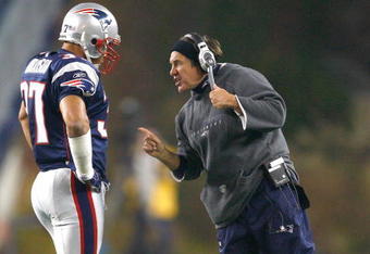 FOXBORO, MA - OCTOBER 20: Bill Belichick chats with Rodney Harrison #37 of the New England Patriots against the Denver Broncos at Gillette Stadium on October 20, 2008 in Foxboro, Massachusetts. The Paytiots won 41-7. (Photo by Jim Rogash/Getty Images)