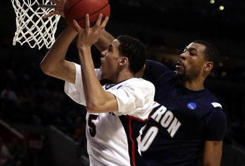PORTLAND, OR - MARCH 19:  Austin Daye #5 of the Gonzaga Bulldogs goes up for a shot against Chris McKnight #30 of the Akron Zips in the second half during the first round of the NCAA Division I Men's Basketball Tournament at the Rose Garden on March 19, 2009 in Portland, Oregon. The Bulldogs defeated the Zips 77-64.  (Photo by Jonathan Ferrey/Getty Images)