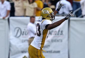 ATLANTA - NOVEMBER 1:  Defensive end Michael Johnson #93 of the Georgia Tech Yellow Jackets celebrates a forced fumble on the Florida State Seminoles quarterback during the game at Bobby Dodd Stadium at Historic Grant Field on November 1, 2008 in Atlanta, Georgia.  The Yellow Jackets beat the Seminoles 31-28.  (Photo by Mike Zarrilli/Getty Images)