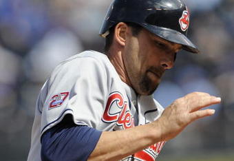 KANSAS CITY, MO - APRIL 15:  Mark Derosa of the Cleveland Indians, wearing a #42 jersey during the Jackie Robinson Day game runs past third base on the way to scoring a run against the Kansas City Royals on April 15, 2009 at Kauffman Stadium in Kansas City, Missouri.  (Photo by G. Newman Lowrance/Getty Images)