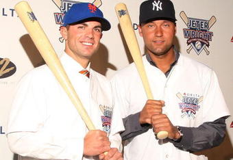 NEW YORK - APRIL 03:  David Wright of the New York Mets and Derek Jeter of the New York Yankees attend Delta's Jeter/Wright batting challenge at the Stone Rose Lounge on April 3, 2009 in New York City.  (Photo by Stephen Lovekin/Getty Images)