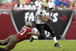 TAMPA, FL - NOVEMBER 30:  Running back Reggie Bush #25 of the New Orleans Saints returns a kick against the Tampa Bay Buccaneers at Raymond James Stadium on November 30, 2008 in Tampa, Florida.  (Photo by Al Messerschmidt/Getty Images)
