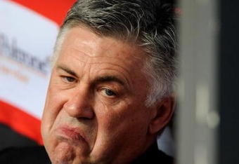 MILAN, ITALY - MAY 10:  Head coach Carlo Ancelotti of AC Milan shows his frustration during the Serie A match between  AC Milan and Juventus at the Meazza Stadium on May 10, 2009 in Milan, Italy. (Photo by Claudio Villa/Getty Images)