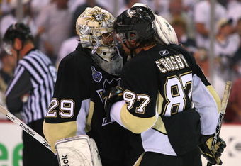 PITTSBURGH - JUNE 09:  Goaltender Marc-Andre Fleury #29 and Sidney Crosby #87 of the Pittsburgh Penguins celebrates a 2-1 win over the Detroit Red Wings during Game Six of the NHL Stanley Cup Finals at the Mellon Arena on June 9, 2009 in Pittsburgh, Pennsylvania.  (Photo by Jim McIsaac/Getty Images)