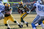 GREEN BAY, WI - DECEMBER 28: Ryan Grant #25 of the Green Bay Packers looks for running room against the Detroit Lions on December 28, 2008 at Lambeau Field in Green Bay, Wisconsin. The Packers defeated the Lions 31-21. (Photo by Jonathan Daniel/Getty Images)
