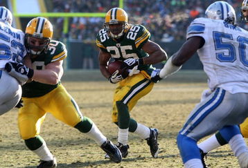 GREEN BAY, WI - DECEMBER 28: Ryan Grant #25 of the Green Bay Packers looks for running room against the Detroit Lions on December 28, 2008 at Lambeau Field in Green Bay, Wisconsin. The Packers defeated the Lions 31-21. (Photo by Jonathan Daniel/Getty Images)