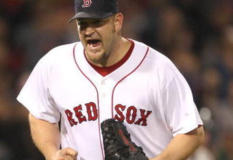 BOSTON - JUNE 11:  Brad Penny #36 of the Boston Red Sox reacts after striking out Hideki Matsui #55 of the New York Yankees in the sixth at Fenway Park on June 11, 2009 in Boston, Massachusetts.  (Photo by Jim Rogash/Getty Images)