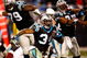 CHARLOTTE, NC - JANUARY 10:  DeAngelo Williams #34 of the Carolina Panthers runs with the ball against  the Arizona Cardinals during the NFC Divisional Playoff Game on January 10, 2009 at Bank of America Stadium in Charlotte, North Carolina. The Arizona Cardinals defeated the Carolina Panthers with a score of 33-13.  (Photo by Streeter Lecka/Getty Images)