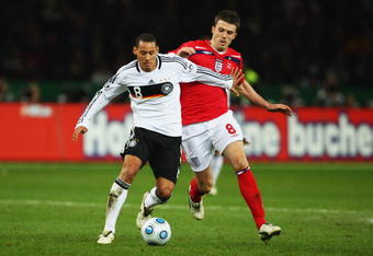 BERLIN - NOVEMBER 19:  Jermaine Jones of Germany and Michael Carrick of England battle for the ball during the International Friendly match between Germany and England at the Olympic stadium on November 19, 2008 in Berlin, Germany.  (Photo by Phil Cole/Getty Images)