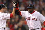 BOSTON - JUNE 11:  David Ortiz #34 of the Boston Red Sox hits a home run and celebrates with teammate Rocco Baldelli against the New York Yankees at Fenway Park on June 11, 2009 in Boston, Massachusetts.  (Photo by Jim Rogash/Getty Images)