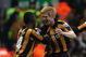 LIVERPOOL, UNITED KINGDOM - DECEMBER 13: Paul McShane of Hull City celebrates scoring the opening goal with his team mate Kamil Zayatte (L) during the Barclays Premier League match between Liverpool and Hull City at Anfield on December 13, 2008 in Liverpool, England. (Photo by Hamish Blair/Getty Images)