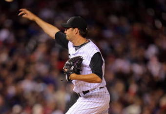 DENVER - APRIL 11:  Pitcher Jason Grilli #49 of the Colorado Rockies delivers as he enters the game in relief against the Philadelphia Phillies during MLB action at Coors Field on April 11, 2009 in Denver, Colorado. The Phillies defeated the Rockies 8-4.  (Photo by Doug Pensinger/Getty Images)