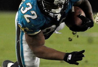 JACKSONVILLE, FL - DECEMBER 18:  Maurice Jones-Drew #32 of the Jacksonville Jaguars dives for yardage during the game against the Indianapolis Colts at Jacksonville Municipal Stadium on December 18, 2008 in Jacksonville, Florida.  (Photo by Sam Greenwood/Getty Images)