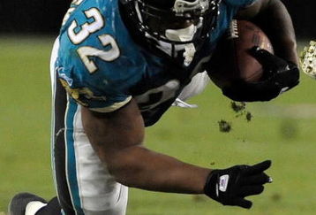 JACKSONVILLE, FL - DECEMBER 18:  Maurice Jones-Drew #32 of the Jacksonville Jaguars dives for yardage during the game against the Indianapolis Colts at Jacksonville Municipal Stadium on December 18, 2008 in Jacksonville, Florida.  (Photo by Sam Greenwood/Getty Images)