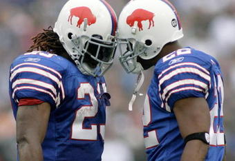 ORCHARD PARK, NY - SEPTEMBER 21:  Marshawn Lynch #23 and Fred Jackson #22 of the Buffalo Bills celebrate Lynch's first touchdown against the Oakland Raiders on September 21, 2008 at Ralph Wilson Stadium in Orchard Park, New York. Buffalo won 24-23. (Photo by Rick Stewart/Getty Images)