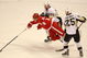 DETROIT - MAY 31:  Marian Hossa #81 of the Detroit Red Wings is tripped up between Sergei Gonchar #55 and Maxime Talbot #25 of the Pittsburgh Penguins  during Game Two of the 2009 Stanley Cup Finals at Joe Louis Arena on May 31, 2009 in Detroit, Michigan.  (Photo by Bruce Bennett/Getty Images)