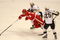 DETROIT - MAY 31:  Marian Hossa #81 of the Detroit Red Wings is tripped up between Sergei Gonchar #55 and Maxime Talbot #25 of the Pittsburgh Penguins  during Game Two of the 2009 Stanley Cup Finals at Joe Louis Arena on May 31, 2009 in Detroit, Michigan.  (Photo by Bruce Bennett/Getty Images)
