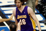 ORLANDO, FL - JUNE 11:  Pau Gasol #16 of the Los Angeles Lakers looks over at Mickael Pietrus #20 (not pictured) as referee Mike Callahan #24 points over at Gasol after he was fouled by Pietrus in overtime in Game Four of the 2009 NBA Finals on June 11, 2009 at Amway Arena in Orlando, Florida.  NOTE TO USER:  User expressly acknowledges and agrees that, by downloading and or using this photograph, User is consenting to the terms and conditions of the Getty Images License Agreement.  (Photo by Ronald Martinez/Getty Images)