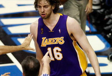 ORLANDO, FL - JUNE 11:  Pau Gasol #16 of the Los Angeles Lakers looks over at Mickael Pietrus #20 (not pictured) as referee Mike Callahan #24 points over at Gasol after he was fouled by Pietrus in overtime in Game Four of the 2009 NBA Finals on June 11, 2009 at Amway Arena in Orlando, Florida.  NOTE TO USER:  User expressly acknowledges and agrees that, by downloading and or using this photograph, User is consenting to the terms and conditions of the Getty Images License Agreement.  (Photo by Ronald Martinez/Getty Images)