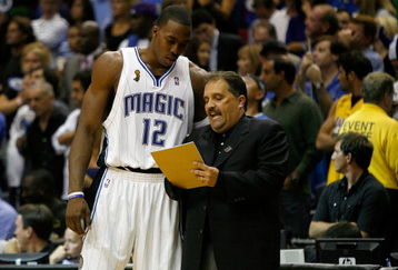 ORLANDO, FL - JUNE 11:  Dwight Howard #12 listens to head coach Stan Van Gundy of the Orlando Magic in Game Four of the 2009 NBA Finals against the Los Angeles Lakers on June 11, 2009 at Amway Arena in Orlando, Florida.  NOTE TO USER:  User expressly acknowledges and agrees that, by downloading and or using this photograph, User is consenting to the terms and conditions of the Getty Images License Agreement.  (Photo by Chris Graythen/Getty Images)