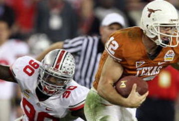 GLENDALE, AZ - JANUARY 05:  Quarterback Colt McCoy #12 of the Texas Longhorns scrambles from Thaddeus Gibson #90 of the Ohio State Buckeyes in the Tostitos Fiesta Bowl Game on January 5, 2009 at University of Phoenix Stadium in Glendale, Arizona. The Longhorns defeated the Buckeyes 24-21  (Photo by Jed Jacobsohn/Getty Images)