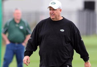 FLORHAM PARK, NJ - MAY 02:  Head coach Rex Ryan of the New York Jets walks on the field during minicamp on May 2, 2009 at the Atlantic Health Jets Training Center in Florham Park, New Jersey.  (Photo by Jim McIsaac/Getty Images)