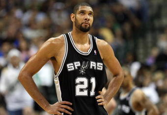 DALLAS - APRIL 25:  Forward Tim Duncan #21 of the San Antonio Spurs during play against the Dallas Mavericks in Game Four of the Western Conference Quarterfinals during the 2009 NBA Playoffs at American Airlines Center on April 25, 2009 in Dallas, Texas. NOTE TO USER: User expressly acknowledges and agrees that, by downloading and or using this photograph, User is consenting to the terms and conditions of the Getty Images License Agreement.  (Photo by Ronald Martinez/Getty Images)