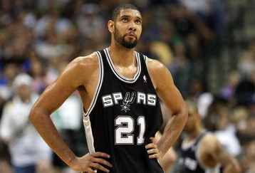 DALLAS - APRIL 25:  Forward Tim Duncan #21 of the San Antonio Spurs during play against the Dallas Mavericks in Game Four of the Western Conference Quarterfinals during the 2009 NBA Playoffs at American Airlines Center on April 25, 2009 in Dallas, Texas. NOTE TO USER: User expressly acknowledges and agrees that, by downloading and or using this photograph, User is consenting to the terms and conditions of the Getty Images License Agreement.  (Photo by Ronald Martinez/Getty Images)