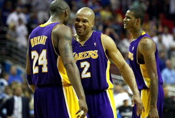 ORLANDO, FL - JUNE 11:  Kobe Bryant #24 and Derek Fisher #2 of the Los Angeles Lakers celebrate in the final moments of the Lakers' overtime win over the Orlando Magic in Game Four of the 2009 NBA Finals on June 11, 2009 at Amway Arena in Orlando, Florida.  NOTE TO USER:  User expressly acknowledges and agrees that, by downloading and or using this photograph, User is consenting to the terms and conditions of the Getty Images License Agreement.  (Photo by Elsa/Getty Images)
