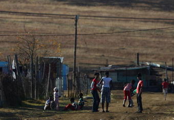 STANDERTON, SOUTH AFRICA - JUNE 12:  Children of the Standerton township enjoy a game of football on June 12, 2009 in Standerton, South Africa.  (Photo by Jamie McDonald/Getty Images)