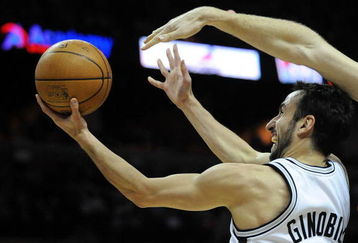 SAN ANTONIO - JANUARY 31:  Guard Manu Ginobili #20 of the San Antonio Spurs takes a shot against the New Orleans Hornets on January 31, 2009 at AT&T Center in San Antonio, Texas.  NOTE TO USER: User expressly acknowledges and agrees that, by downloading and/or using this Photograph, user is consenting to the terms and conditions of the Getty Images License Agreement.  (Photo by Ronald Martinez/Getty Images)
