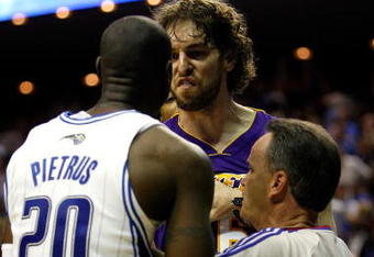 ORLANDO, FL - JUNE 11:  Pau Gasol #16 of the Los Angeles Lakers exchanges words with Mickael Pietrus #20 of the Orlando Magic in overtime of Game Four of the 2009 NBA Finals on June 11, 2009 at Amway Arena in Orlando, Florida.  NOTE TO USER:  User expressly acknowledges and agrees that, by downloading and or using this photograph, User is consenting to the terms and conditions of the Getty Images License Agreement.  (Photo by Chris Graythen/Getty Images)