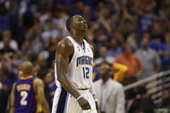 ORLANDO, FL - JUNE 11:  Dwight Howard #12 of the Orlando Magic head to the sideline during Game Four of the 2009 NBA Finals against the Los Angeles Lakers on June 11, 2009 at Amway Arena in Orlando, Florida. The Lakers won in overtime 99-91. NOTE TO USER:  User expressly acknowledges and agrees that, by downloading and or using this photograph, User is consenting to the terms and conditions of the Getty Images License Agreement. (Photo by Chris Graythen/Getty Images)