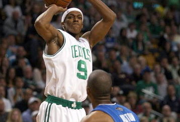 BOSTON - MAY 17:  Rajon Rondo #9 of the Boston Celtics takes a shot as Rafer Alston #9 of the Orlando Magic defends in Game Seven of the Eastern Conference Semifinals during the 2009 NBA Playoffs at TD Banknorth Garden on May 17, 2009 in Boston, Massachusetts. NOTE TO USER: User expressly acknowledges and agrees that, by downloading and or using this photograph, User is consenting to the terms and conditions of the Getty Images License Agreement.  (Photo by Elsa/Getty Images)