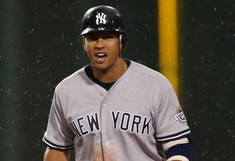 BOSTON - JUNE 11: Alex Rodriguez #13 of  New York Yankees celebrates after hitting a double to knock in two runs in the seventh inning against the Boston Red Sox at Fenway Park on June 11, 2009 in Boston, Massachusetts.  (Photo by Jim Rogash/Getty Images)
