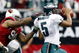 GLENDALE, AZ - JANUARY 18:  Quarterback Donovan McNabb #5 of the Philadelphia Eagles looks to avoid a sack from defensive end Darnell Dockett #90 of the Arizona Cardnals during the NFC championship game on January 18, 2009 at University of Phoenix Stadium in Glendale, Arizona.  (Photo by Jamie Squire/Getty Images)