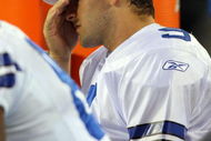 PHILADELPHIA - DECEMBER 28: Tony Romo #9 of the Dallas Cowboys sits on the bench late in the game against the Philadelphia Eagles on December 28, 2008 at Lincoln Financial Field in Philadelphia, Pennsylvania. The Eagles defeated the Cowboys 44-6. (Photo by Jim McIsaac/Getty Images)