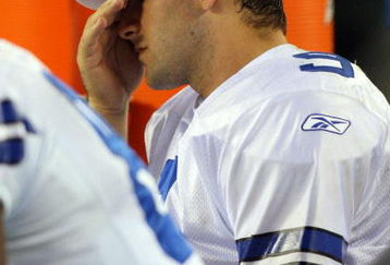 PHILADELPHIA - DECEMBER 28:  Tony Romo #9 of the Dallas Cowboys sits on the bench late in the game against the Philadelphia Eagles on December 28, 2008 at Lincoln Financial Field in Philadelphia, Pennsylvania. The Eagles defeated the Cowboys 44-6.  (Photo by Jim McIsaac/Getty Images)