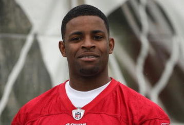 SANTA CLARA, CA - MAY 01:  Michael Crabtree #15 of the San Francisco 49ers looks on at practice during the 49ers Minicamp at their training facilities on May 1, 2009 in Santa Clara, California. Crabtree was the 49ers first round draft pick.  (Photo by Jed Jacobsohn/Getty Images)
